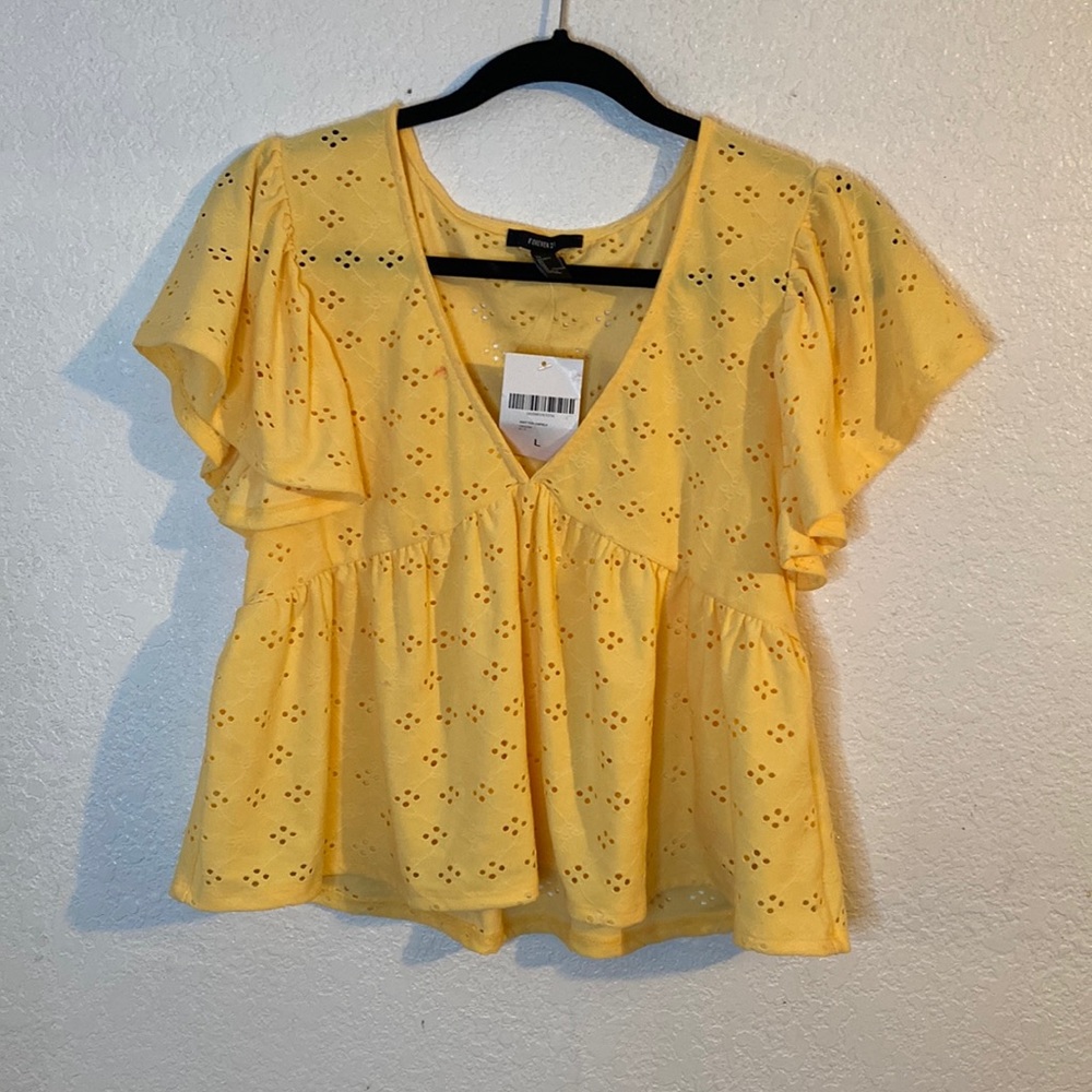 Yellow flowy top